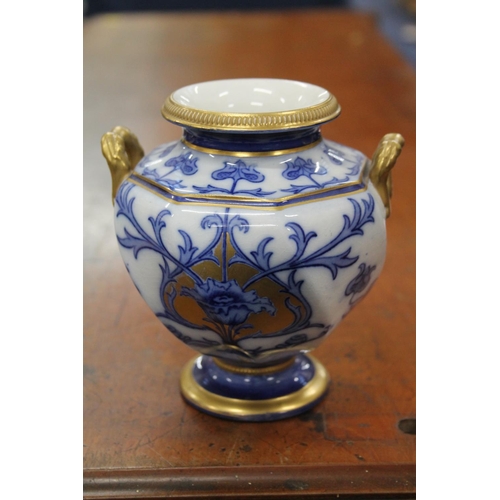 270 - James McIntyre & Co.  Burslem Florian style blue and gilt decorated urn.