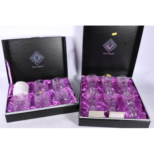 230 - Two boxed sets of six Edinburgh Crystal glasses.