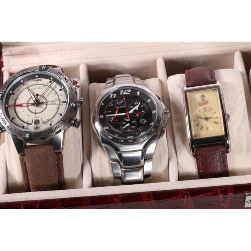 705 - Six gents fashion watches in red crocodile skin effect watch case. 