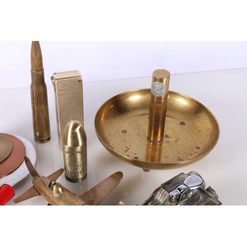 714 - Novelty cigarette lighters to include 'Trench Art' style bullet shell lighter, WWI penny lighter, Je... 