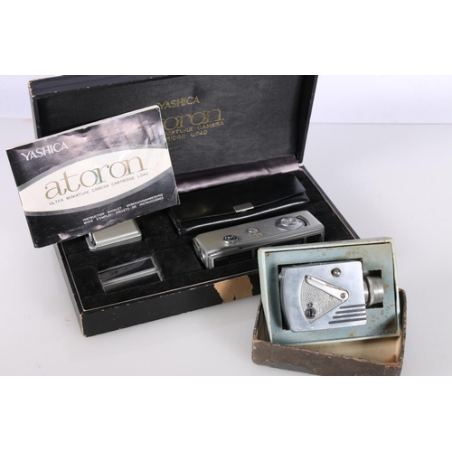 718 - Yashica Atoron ultra miniature camera in fitted case with accessories and instruction booklet, and a... 