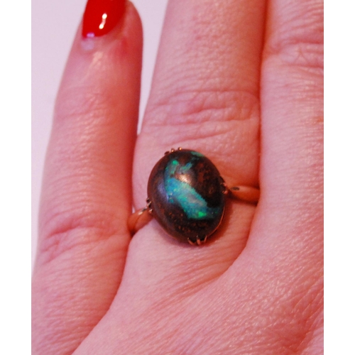 35 - Gold ring with matrix opal cabochon, in gold, '9ct', probably 1930s, size R½, 3g gross.