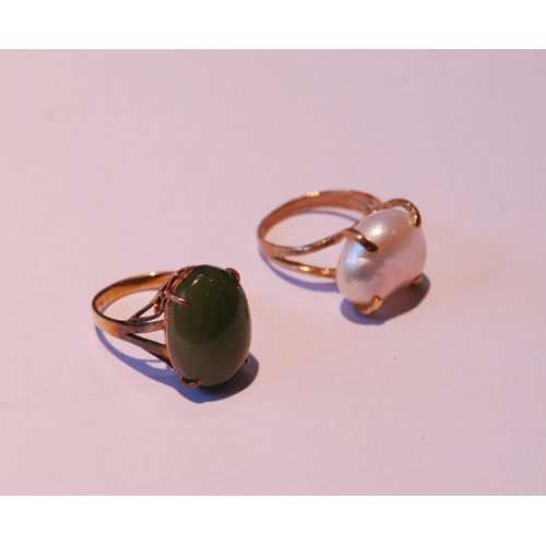 36 - Gold ring with oval nephrite cabochon, '14k', and another with baroque pearl, 9ct, sizes L½ and M, 9... 