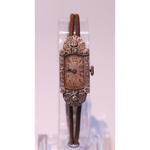 96 - Lady's Art Deco evening watch with sprays and bands of brilliant and eight-cut diamonds, 'Platinum',... 