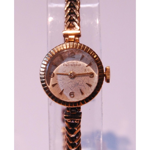 98 - Lady's Girard-Perregaux 9ct gold bracelet watch.