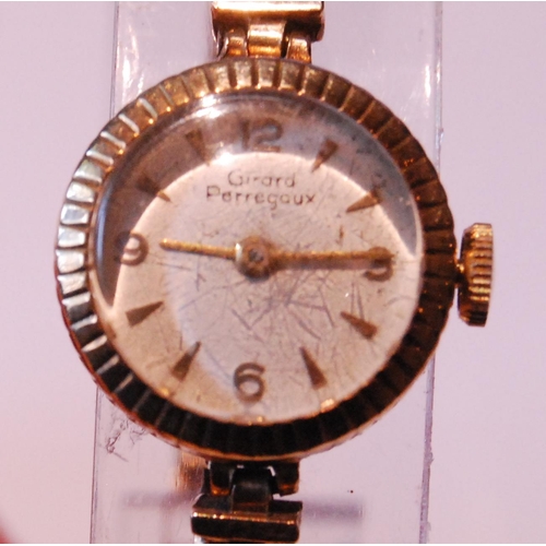 98 - Lady's Girard-Perregaux 9ct gold bracelet watch.