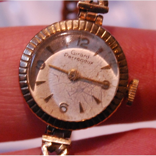 98 - Lady's Girard-Perregaux 9ct gold bracelet watch.