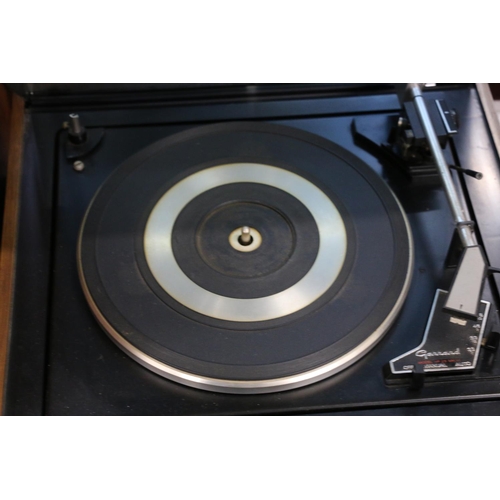 243A - Collection of audio equipment to include a Garrard turntable, Technics quartz, Rotel tuner etc.