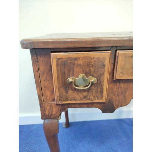 400 - George III walnut lowboy with small centre drawer flanked by deep drawers, on cabriole supports with... 