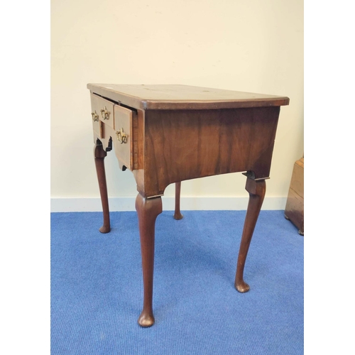 400 - George III walnut lowboy with small centre drawer flanked by deep drawers, on cabriole supports with... 