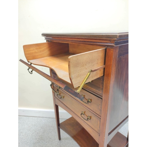 404 - Edwardian inlaid music cabinet with four graduated pull out drawers above undertier on tapered suppo... 