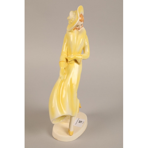 15 - Art deco style woman in yellow, 29cm h