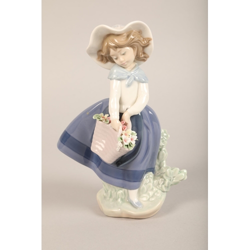 28 - Four Lladro figure of children and animals