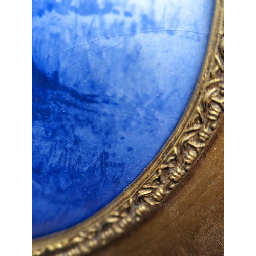 185 - 19th century Delft blue and white convex plaque depicting two children hiding by a tree, 15cm diamet... 