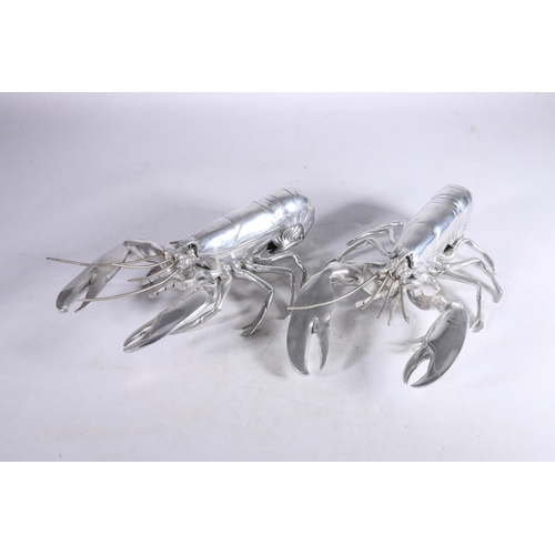 352 - Pair of Louise Bradley white metal lobster models, 30.5cm long.