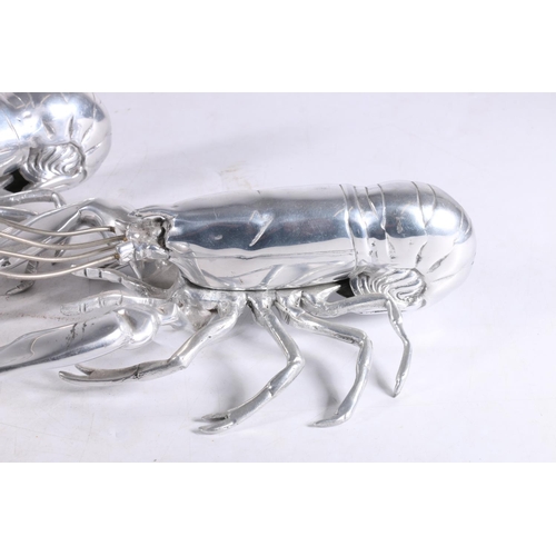 352 - Pair of Louise Bradley white metal lobster models, 30.5cm long.