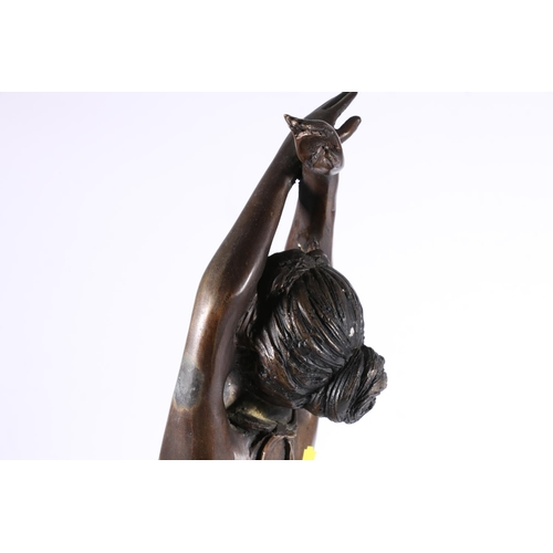 360 - Modern cast metal statue modelled as a young female ballerina with crossed arms, 53cm tall. 