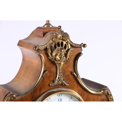 374 - German Rococo style walnut cased mantel clock with gilt metal mounts, the enamel dial with Roman and... 