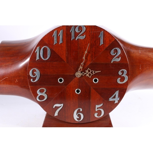 376 - 20th century mantle clock made from an aeroplane propeller boss, the works striking on four gongs ma... 