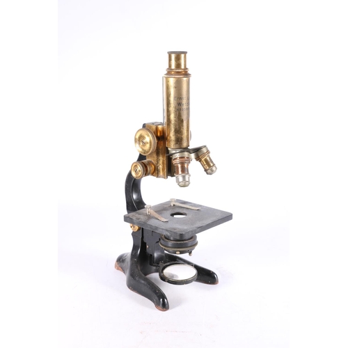 377 - Ernst Leitz Wetzlar monocular microscope, numbered '258501' with three Leitz lenses, 34cm tall. ... 