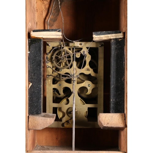 378 - German oak cuckoo clock in architectural castle shaped case, the movement striking on a gong, 67cm t... 