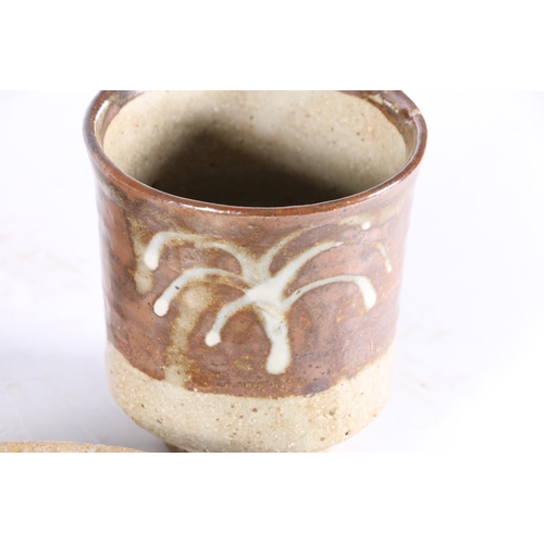 412 - JOHN BEDDING (b1947), a studio pottery footed yunomi tea cup, JR mark to the ring foot, 11cm tall, a... 