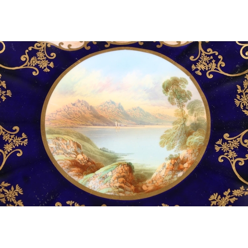 422 - Aynsley porcelain cabinet plate, the central vignette depicting a lake scene with two further floral... 