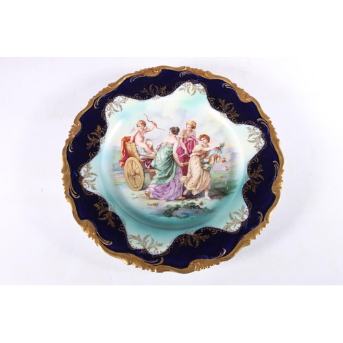 423 - Rosenthal and Company porcelain cabinet plate, the centre with scene depicting three graces pulling ... 