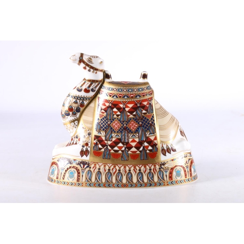 424 - Royal Crown Derby bone china paperweight in the form of a camel, date mark 'LIX' for 1996, gold stop... 