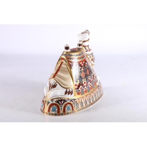 424 - Royal Crown Derby bone china paperweight in the form of a camel, date mark 'LIX' for 1996, gold stop... 