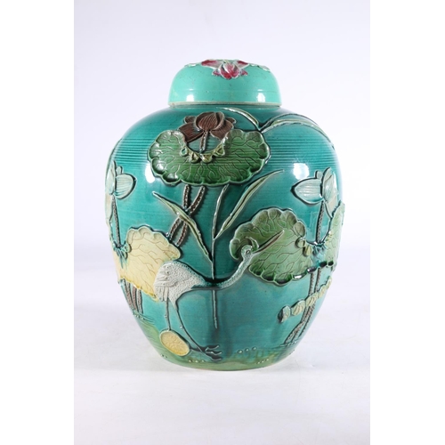 Chinese Wang Bing Rong relief decorated baluster shaped ginger jar and  cover, the turquoise blue gre