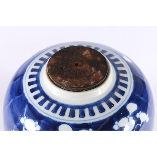 456 - Chinese blue and white porcelain ginger jar and cover decorated with prunus blossom design on a crac... 