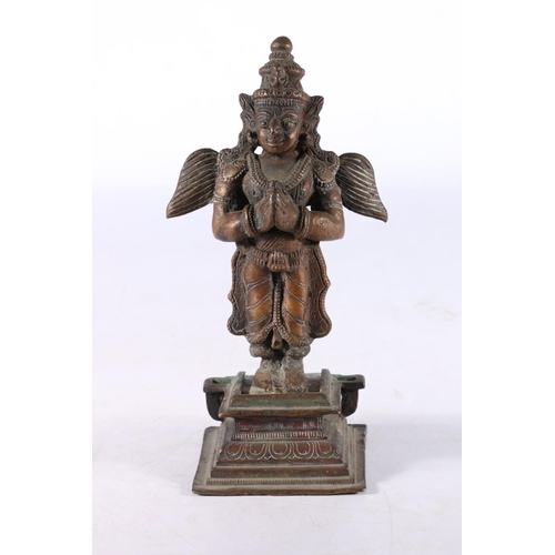 468 - Eastern cast metal model of the Hindu deity Garuda, 18cm tall. 