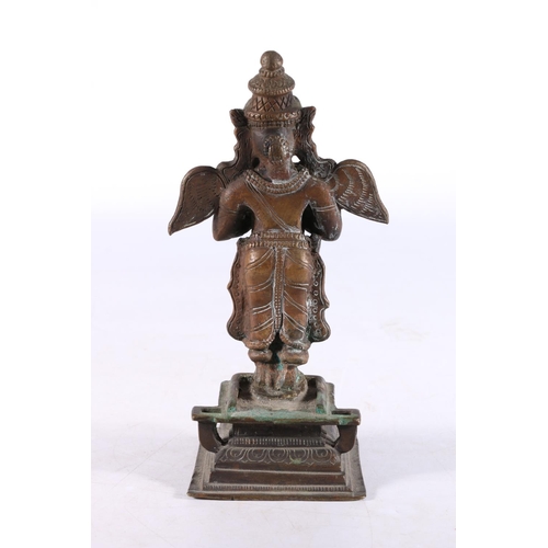 468 - Eastern cast metal model of the Hindu deity Garuda, 18cm tall. 