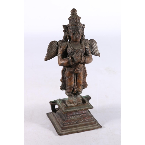 468 - Eastern cast metal model of the Hindu deity Garuda, 18cm tall. 