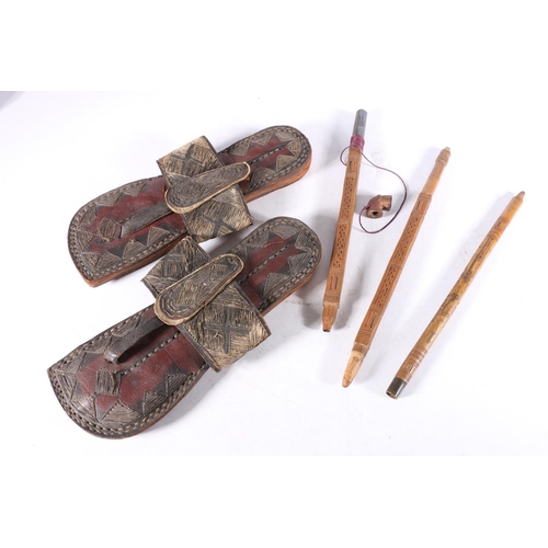 473 - Pair of Eastern leather and stitched thread sandals, 27cm long and a Chinese style two section carve... 