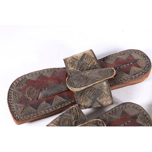 473 - Pair of Eastern leather and stitched thread sandals, 27cm long and a Chinese style two section carve... 