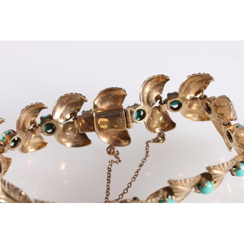 136 - 9ct gold leaf design bracelet set with turquoise cabochons, makers mark 'HB', 18.9g gross.