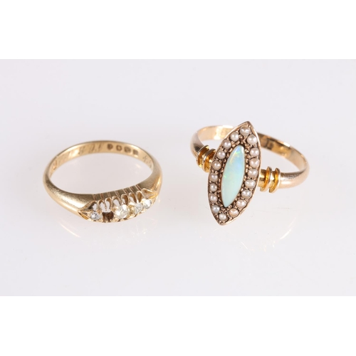 137 - 15ct gold ring set with navette shaped opal encircled by seed pearls, makers mark 'H&S', size P/... 