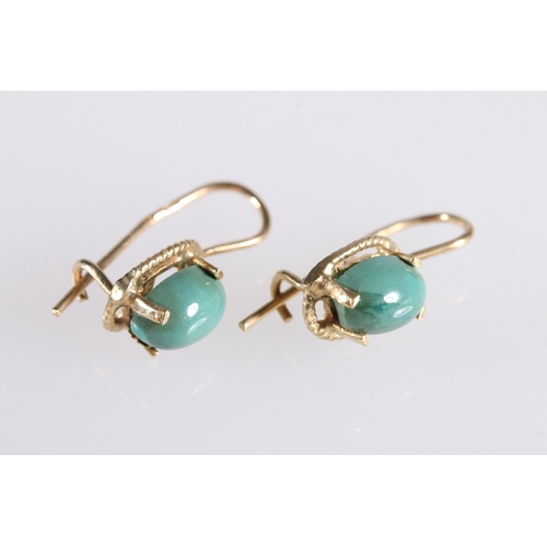 141 - Chinese gold bar brooch set with oval jade cabochon stone, 2g gross, a pair of similar earrings 1.6g... 