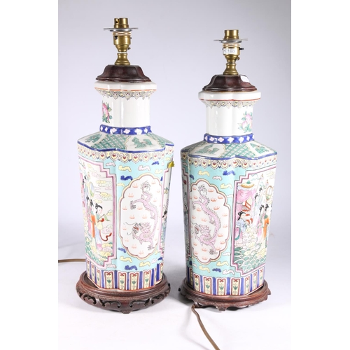 452 - Pair of Chinese Canton famille rose converted table lamps decorated with panels of polychrome five c... 