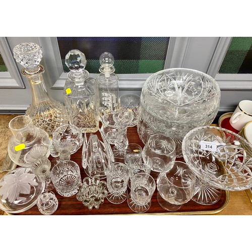 314 - Quantity of crystal glass including decanters, ship in bottle, etc