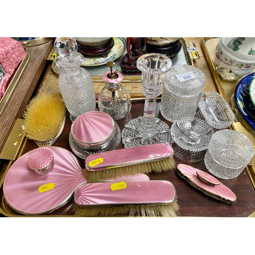 299 - Silver mounted and pink enamel dressing table set, with cut glass dressing table set