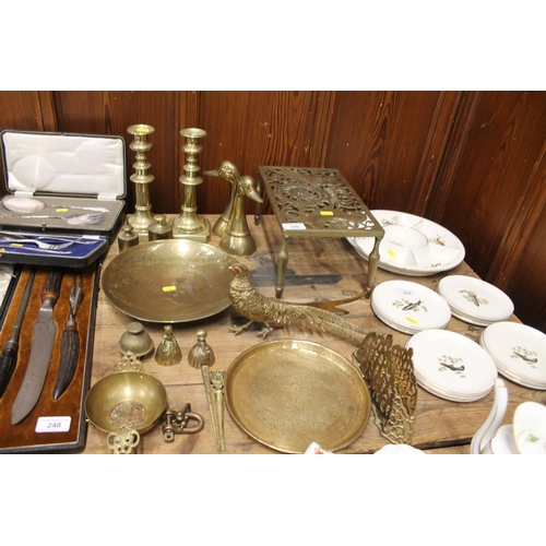 249 - Brass ware to include a Scottish double trivet, a pair of duck bookends, a pair of candlesticks, a C... 