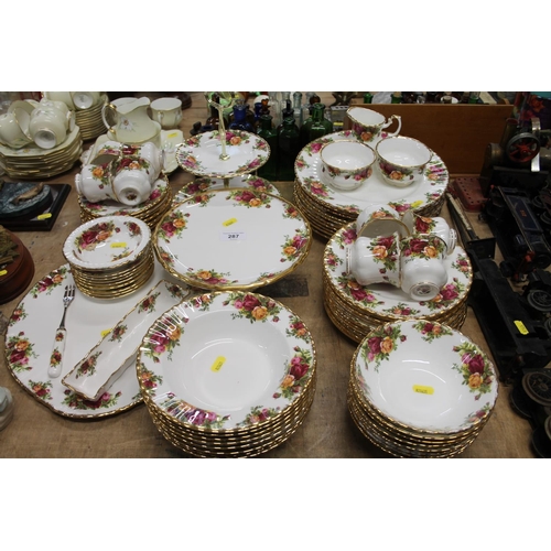 287 - Royal Albert Old Country Roses dinner set to include a two-tier cake stand, a bread plate, bowls, di... 