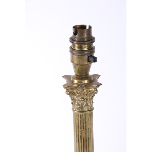 102 - Brass lamp of Corinthian column form, 35cm.