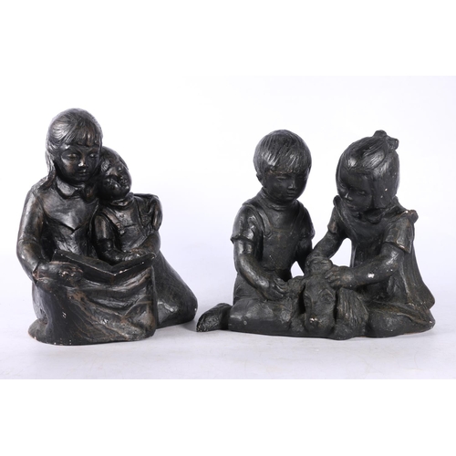 106 - Two sculptures of seated children by Austin Productions, tallest measures 21cm.