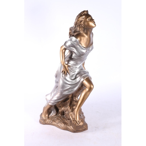 111 - Model of a female seated on a rock by Austin Productions, 46cm.