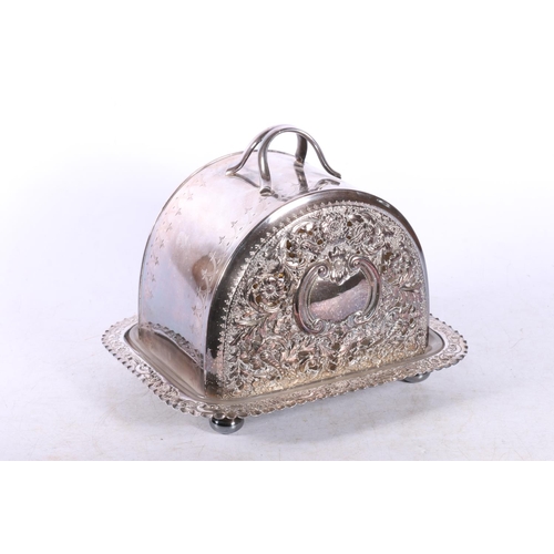 126 - Silver plated lidded serving dish decorated with scrolls and flowers, 18cm.