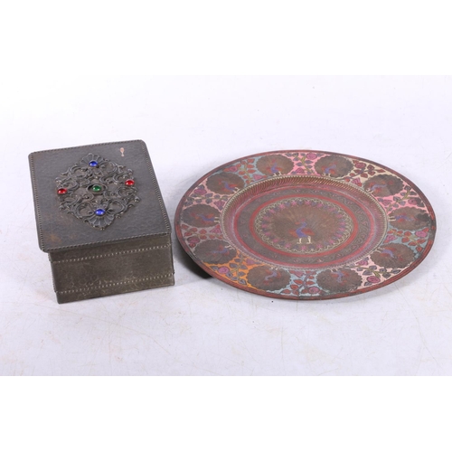 127 - Hammered pewter hinged box and an Indian peacock decorated plate.